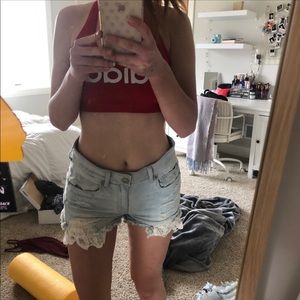 american eagle light wash with lace whit pockets